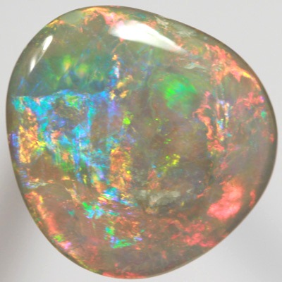 SOLID SEMI BLACK OPAL Gem quality! Very bright rolling flashes. SEE VIDEO